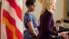 First Lady Michelle Obama listens as Dr. Jill Biden delivers remarks to a bipartisan group of governors attending the National Governors Association’s meeting