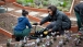 First Lady Michelle Obama Works in the White House Kitchen Garden with Students
