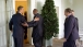 President Obama Holds Open the Door