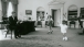 President John F. Kennedy with children, Caroline and John, Jr.