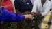 Secretary Clinton Shakes The Hands Of Students