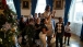 First Lady Michelle Obama walks with children of military families in the Blue Room