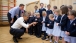 President Barack Obama and British Prime Minister David Cameron visit with students while touring Enniskillen Primary School