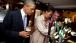 First Lady Michelle Obama Draws a Pint at Ollie Hayes’ Pub