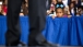 A young girl listens to President Obama at a town hall discussion