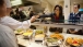 First Lady Michelle Obama Greets a Chef at Little Rock Air Force Base 
