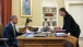 President Obama talks with National Security Advisor Susan E. Rice