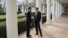 President Obama Talks With Secretary Lew On The Colonnade