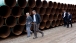 President Obama Walks At TransCanada Stillwater Pipe Yard