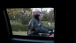 A Man On A Motorcycle Accompanies The Motorcade