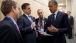 President Barack Obama Talks With Staff