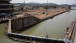 President Obama walks across a lock at the Panama Canal