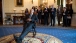 President Obama sits in a rocking chair