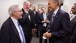 President Barack Obama talks with E.J. Dionne, Jr.
