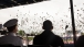 President Barack Obama Watches As Graduates Toss Their Hats