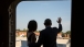 President Obama and First Lady Michelle Obama Wave as They Board Air Force One