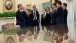 President Barack Obama Talks With Members Of His Staff