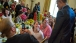 President Obama talks with guests during the Kids' State Dinner