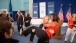 First Lady Michelle Obama is Lifted by U.S. Olympic Wrestler Elena Pirozhkova 