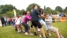 Mrs. Obama Participates In A Tug Of War