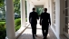 President Obama Walks Along the Colonnade with Press Secretary Jay Carney