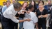 President Obama Signs A Line Worker's Shirt