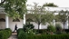 President Obama Walks Along The Colonnade Of The White House