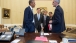 President Obama Talks with Advisors in the Oval Office