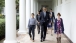 President Obama walks with the families of Sec. Duncan and Dr. John King