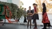 First Lady Michelle Obama, with daughters Sasha and Malia, and the family dog Bo, receives the official White House Christmas tree