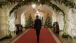 President Obama Walks Through The Ground Floor Corridor