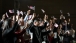 Newly naturalized citizens wave American flags