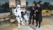 President Barack Obama and First Lady Michelle Obama dance with a Storm Trooper and R2-D2