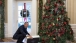 President Obama Opens A Christmas Gift