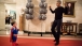 President Barack Obama Flexes Biceps with Superman 