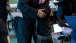 Roxana Giron hugs President Barack Obama