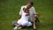 President Barack Obama sits with Sasha during a barbecue in celebration of his 49th birthday