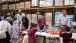 President Obama and family participate in a service project at the Capital Food Bank