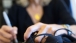 Dr. Jill Biden Signs a Pair of Her Running Shoes 