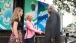 Dr. Jill Biden, granddaughter Finnegan Biden, and President Ernest Bai Komora stand beneath