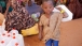 A Child with a Water Jug at the Dagahaley Refugee Camp in Dadaab, Kenya