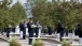 Troops Stand With Wreaths