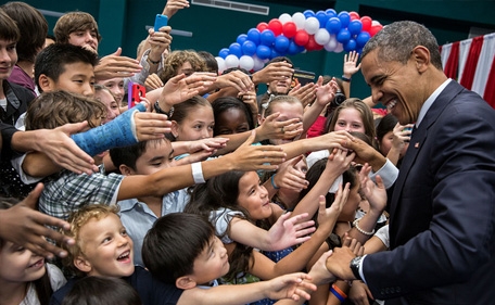 President Barack Obama greets the children of U.S. embassy staff during a reception at the Chulalongkorn University Sports Center in Bangkok, Thailand, Nov. 18, 2012.