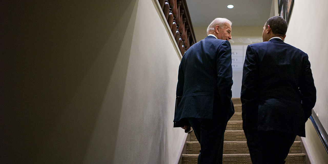 President Barack Obama and Vice President Joe Biden talk as they walk up a staircase in the West Wing of the White House, April 3, 2012. (Official White House Photo by Pete Souza)