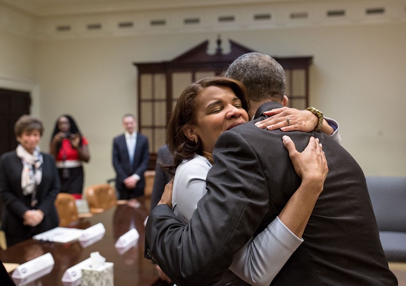 President Barack Obama hugs Kemba Smith 