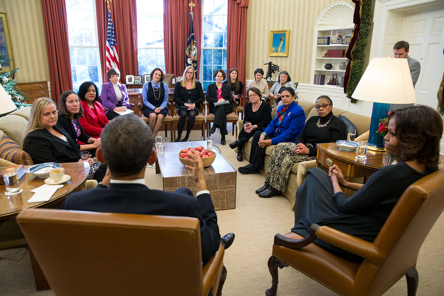 President Barack Obama and First Lady Michelle Obama meet with mothers regarding the Affordable Care Act