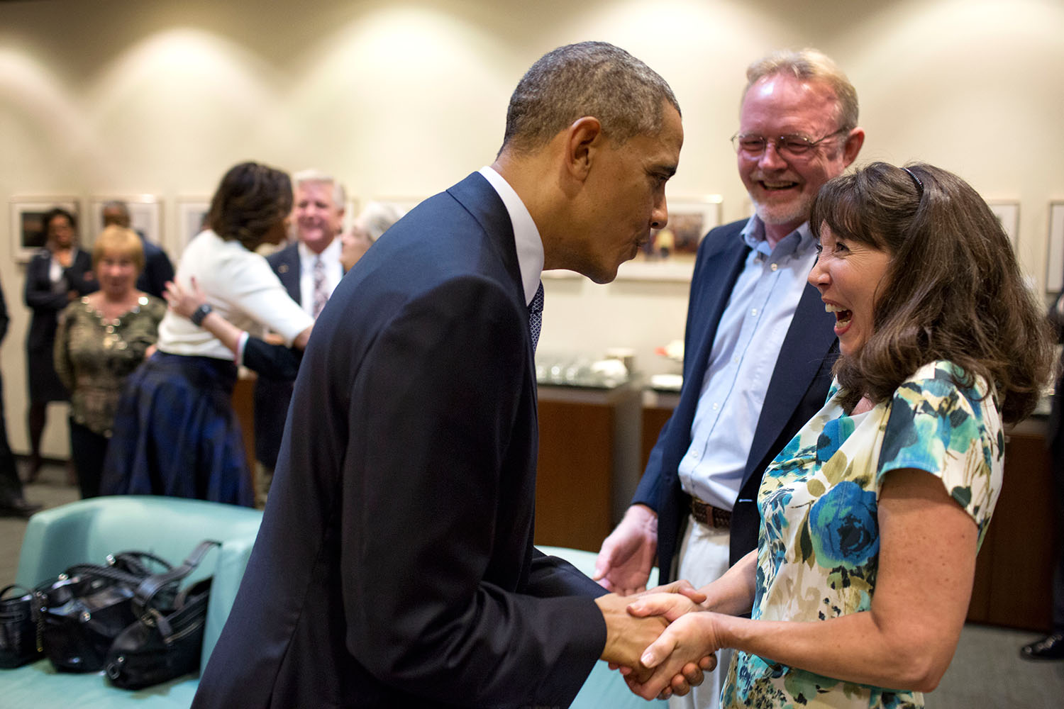 President Obama meets with folks who benefitted from the ACA