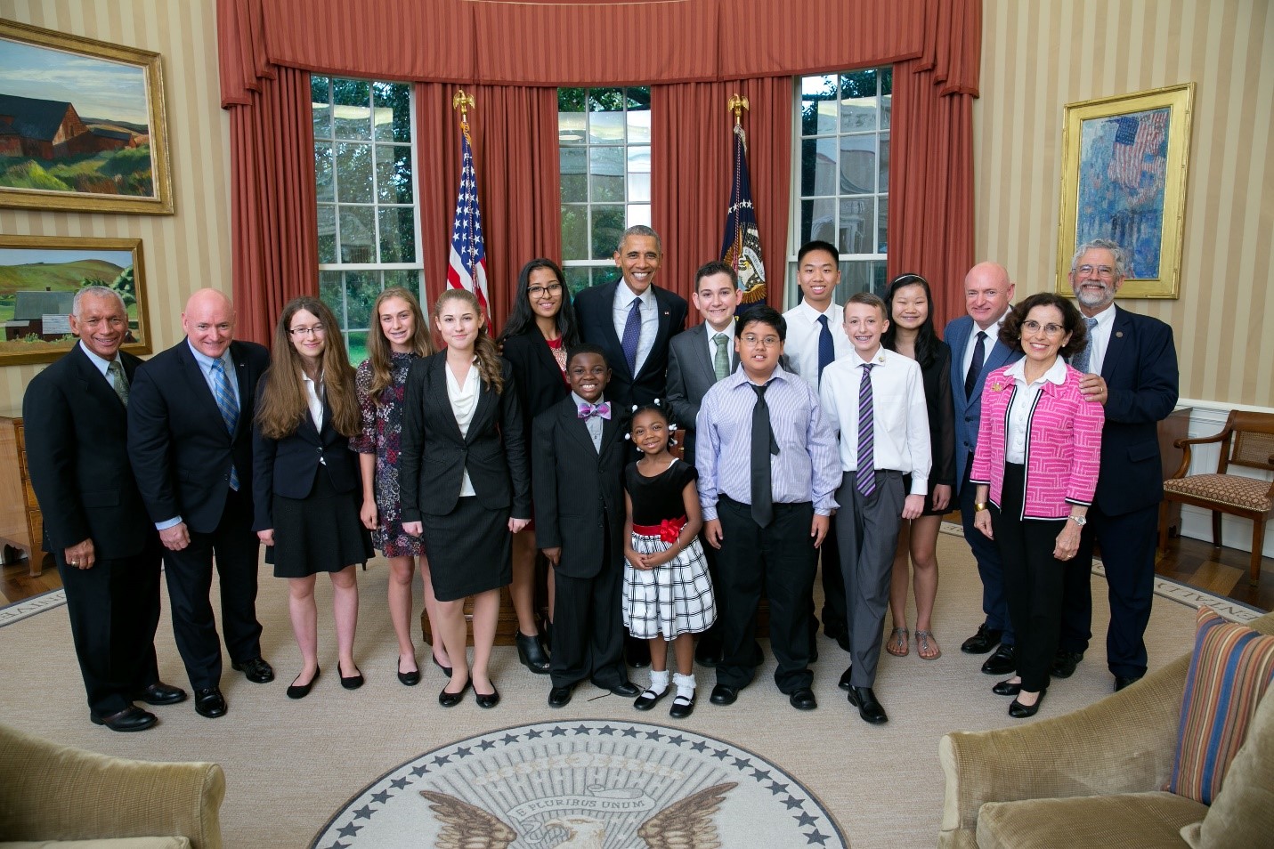 President Barack Obama joins Kids Science Advisors for a group photo in the Oval Office, Oct. 21, 2016. Also pictured are: retired NASA astronauts Scott Kelly (Captain, USN, Ret.) and his twin brother, Mark Kelly (Captain, USN, Ret.), NASA Administrator Charles Bolden; Dr. John Holdren, Director of the Office of Science and Technology Policy (OSTP) and National Science Foundation Director France Córdova. (Official White House Photo by Lawrence Jackson)