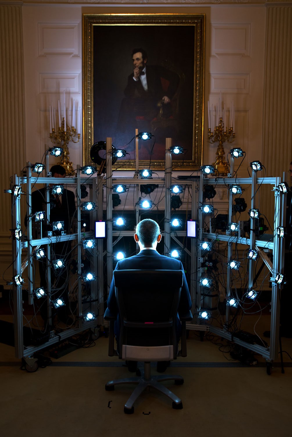The President sits for a 3D portrait being produced by the Smithsonian Institution. There were so many cameras and strobe lights flashing but the end result was kind of cool. (Official White House Photo by Pete Souza)