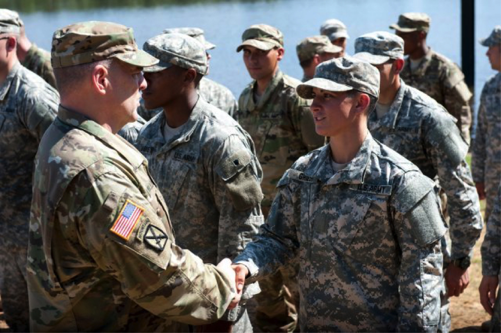 U.S. Army Maj. Gen. Scott Miller congratulates Capt. Kristen Griest and U.S. Army Ranger School Class 08-15 during their graduation at Fort Benning, Georgia, Aug. 21, 2015. Griest and class member 1st Lt. Shaye Haver became the first female graduates of the school. Army photo.